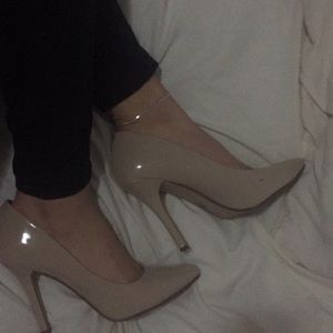 Nude closed pointed toe heels